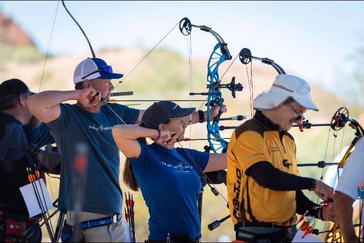 OwnerDeannaAndBrianAimingCompoundBow